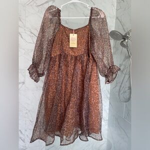 Entro cheetah dress. Size medium. New with tags